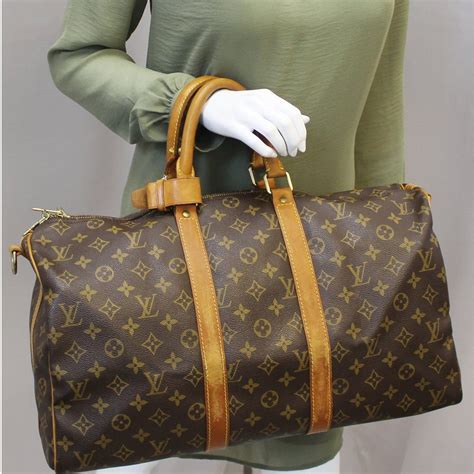 louis vuitton navy sac duffle reviews|lv keepall duffle bag review.